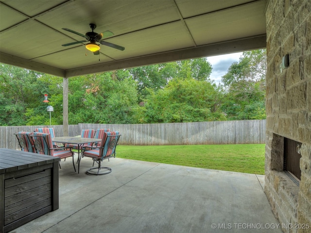 view of patio / terrace featuring ceiling fan