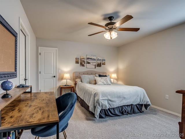 bedroom with ceiling fan and carpet flooring