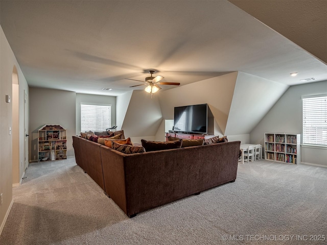 living room featuring light carpet, lofted ceiling, and ceiling fan