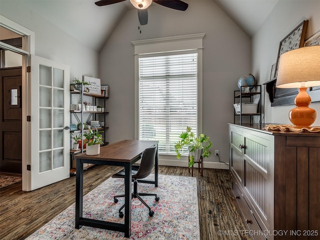 home office with ceiling fan, lofted ceiling, and dark hardwood / wood-style flooring