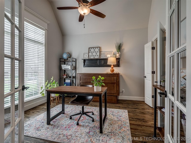 office space featuring french doors, ceiling fan, dark hardwood / wood-style flooring, and vaulted ceiling