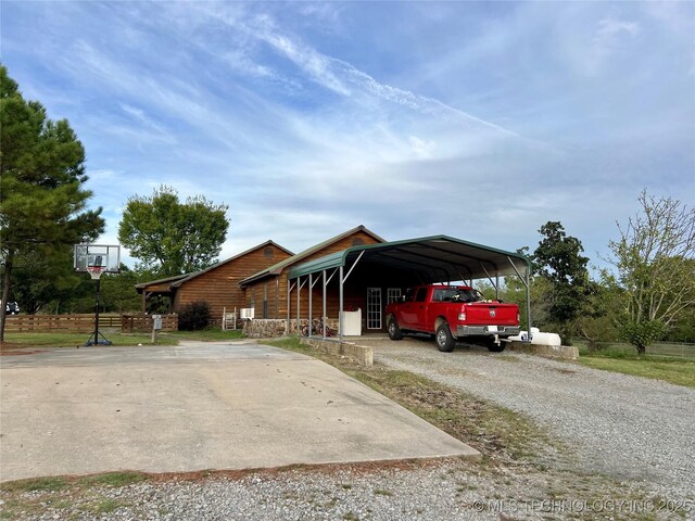 view of front facade with a carport