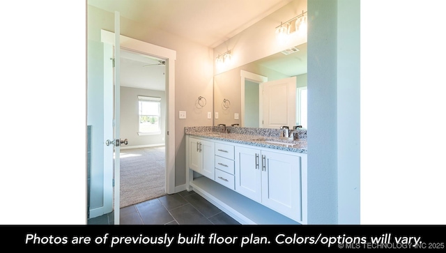 bathroom featuring tile patterned floors and vanity