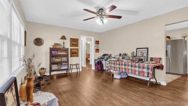 interior space featuring hardwood / wood-style floors and ceiling fan