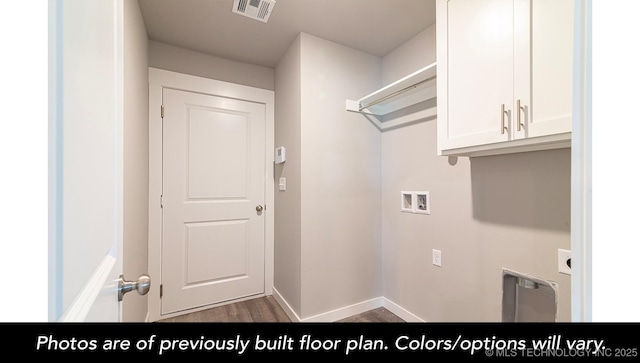 washroom with cabinets, washer hookup, dark hardwood / wood-style flooring, and electric dryer hookup