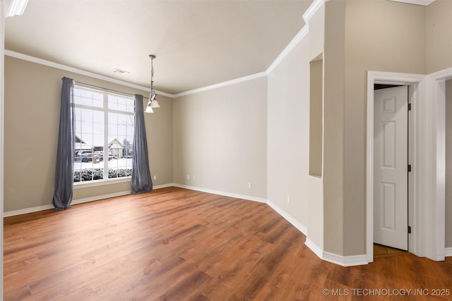 unfurnished dining area featuring hardwood / wood-style flooring and ornamental molding