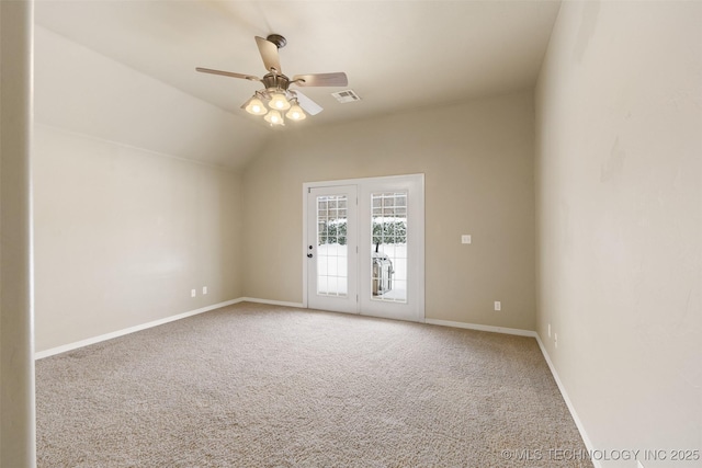 unfurnished room with carpet, lofted ceiling, and ceiling fan