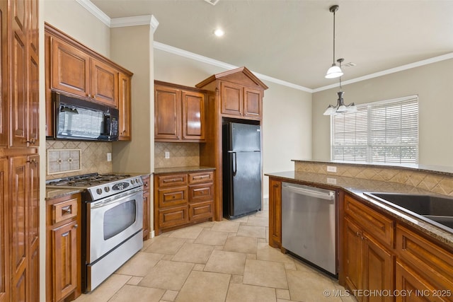 kitchen featuring tasteful backsplash, decorative light fixtures, crown molding, and black appliances