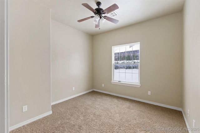 carpeted empty room with ceiling fan