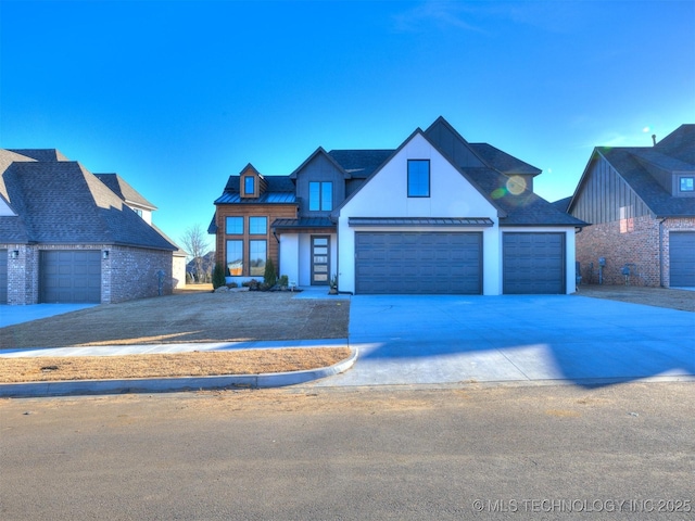 view of front of home with a garage