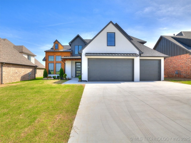 2508 E 135th Dr S, Bixby, OK 74008 - view of front of home with concrete driveway, a standing seam roof, a front yard, a garage, and stucco siding