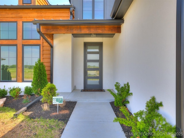 2508 E 135th Dr S, Bixby, OK 74008 - property entrance featuring stucco siding