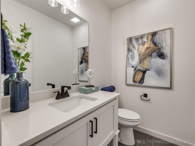 2508 E 135th Dr S, Bixby, OK 74008 - bathroom featuring vanity, toilet, baseboards, and tile patterned floors