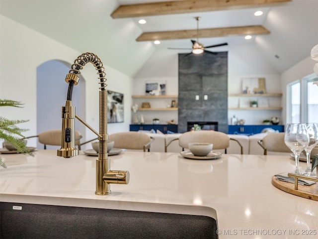 2508 E 135th Dr S, Bixby, OK 74008 - kitchen featuring ceiling fan, open floor plan, and a sink