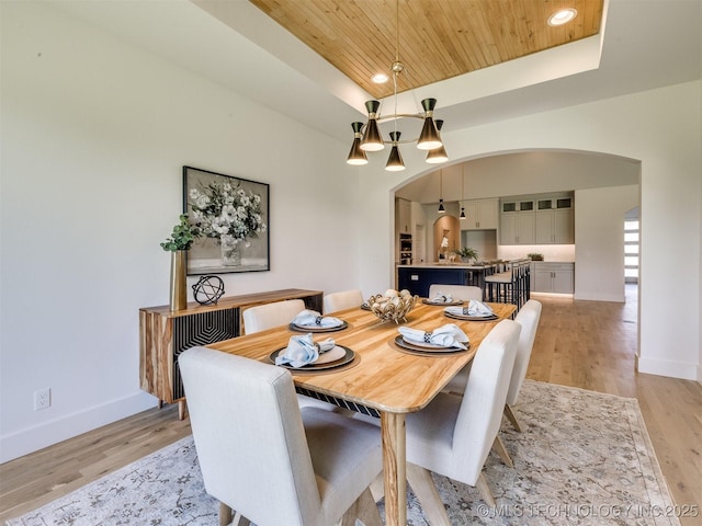 2508 E 135th Dr S, Bixby, OK 74008 - dining area featuring arched walkways, wooden ceiling, light wood-type flooring, baseboards, and recessed lighting
