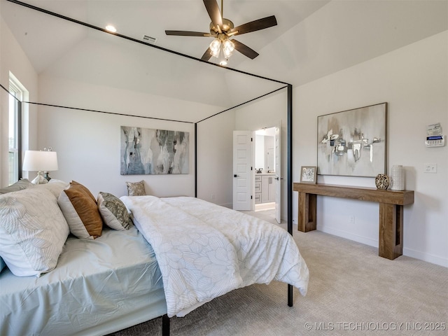 2508 E 135th Dr S, Bixby, OK 74008 - bedroom featuring vaulted ceiling, light colored carpet, baseboards, and ensuite bath