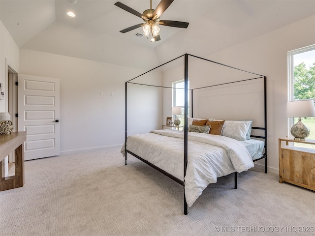 2508 E 135th Dr S, Bixby, OK 74008 - bedroom with lofted ceiling, multiple windows, carpet, and baseboards