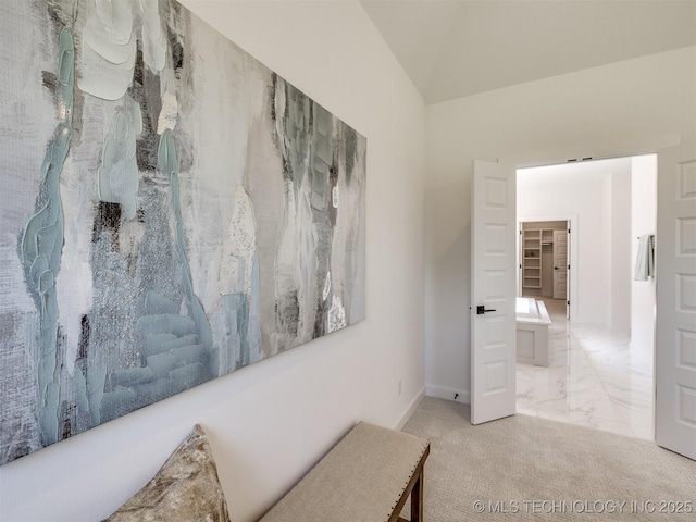 2508 E 135th Dr S, Bixby, OK 74008 - hallway featuring vaulted ceiling and baseboards
