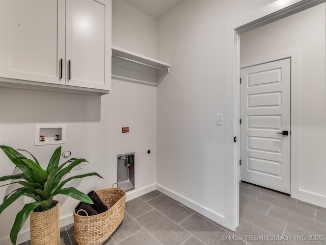 2508 E 135th Dr S, Bixby, OK 74008 - laundry room featuring hookup for an electric dryer, cabinet space, baseboards, and hookup for a washing machine