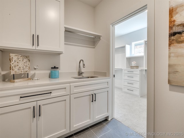 2508 E 135th Dr S, Bixby, OK 74008 - indoor wet bar featuring light carpet and light tile patterned floors