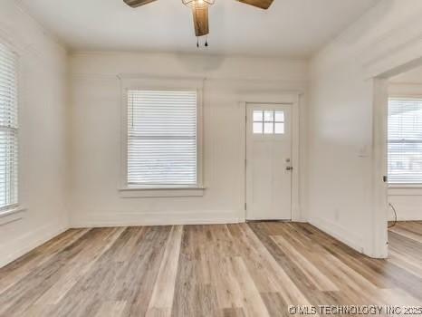 entryway featuring ceiling fan and light wood-type flooring