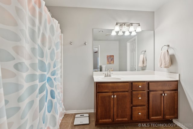 bathroom featuring tile patterned floors and vanity