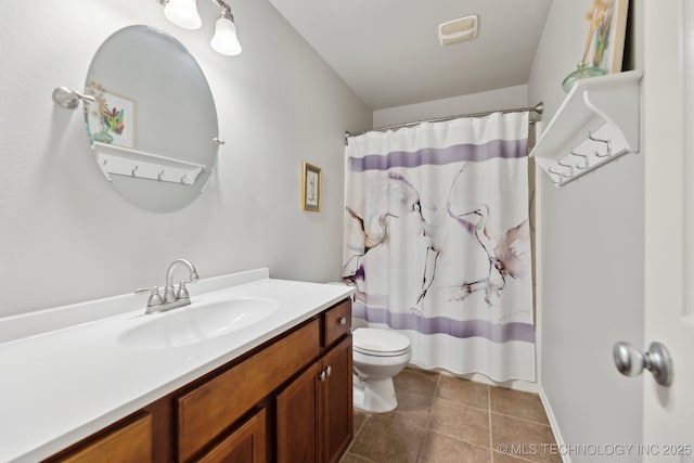 bathroom featuring vanity, toilet, curtained shower, and tile patterned flooring