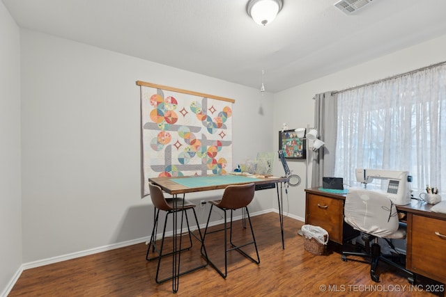 office space with dark hardwood / wood-style floors