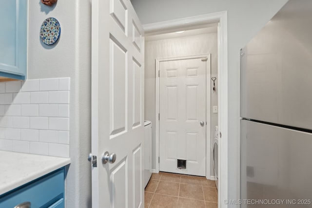 interior space featuring light tile patterned floors