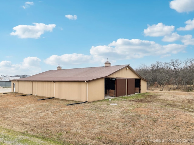 exterior space with an outbuilding