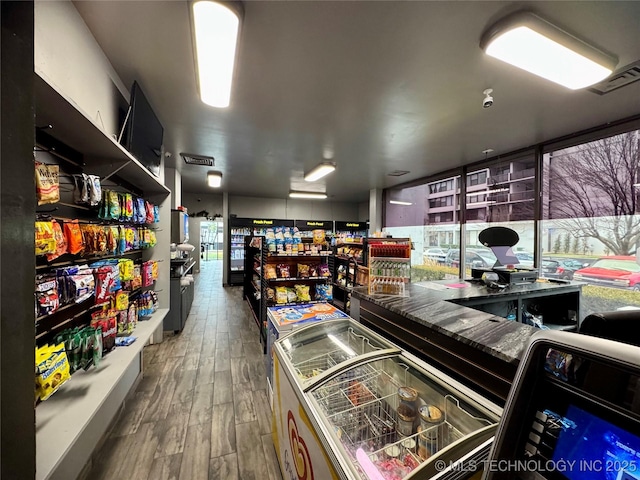 game room featuring dark hardwood / wood-style floors