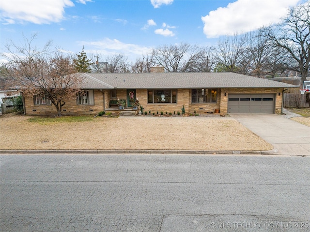 single story home with a garage