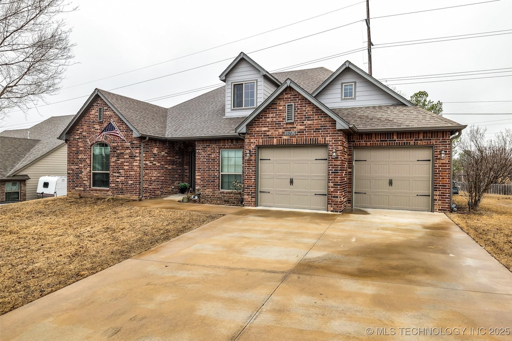 view of front of property with a garage