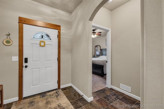 entryway featuring ceiling fan