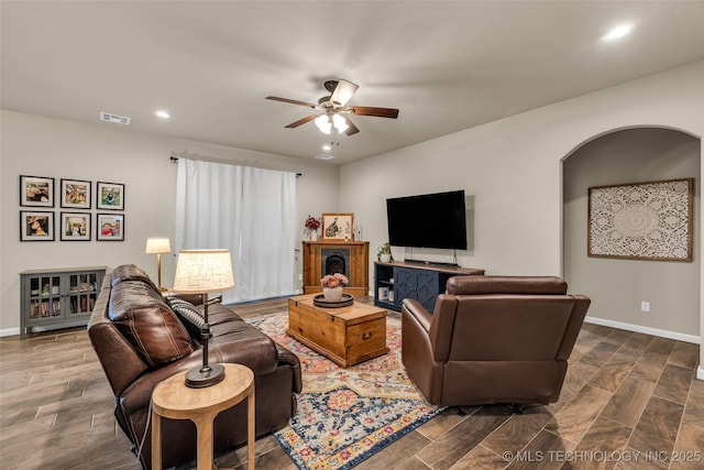 living room featuring ceiling fan