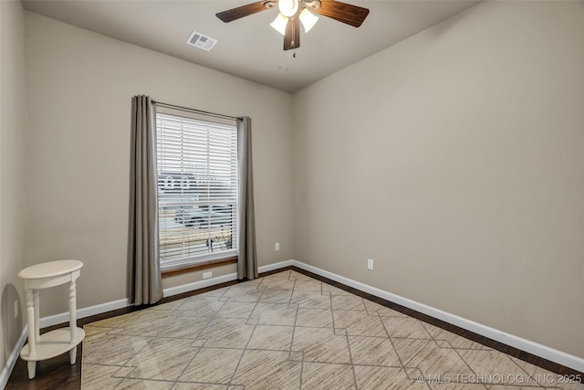 spare room with light hardwood / wood-style floors and ceiling fan