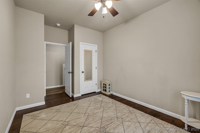 unfurnished bedroom with hardwood / wood-style flooring and ceiling fan