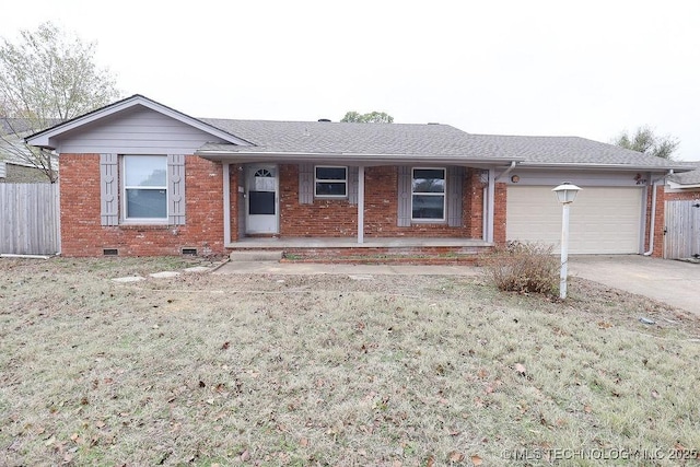 single story home featuring a garage and a front lawn