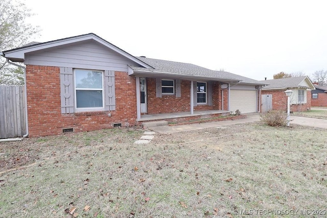 ranch-style house featuring a garage, a front lawn, and a porch