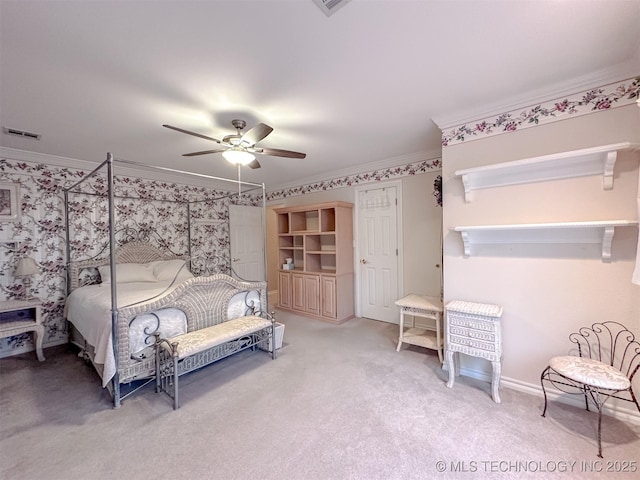 bedroom with a ceiling fan, carpet, visible vents, and crown molding