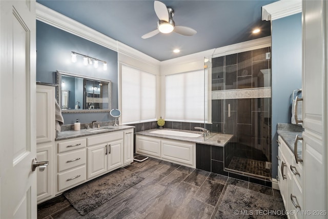 bathroom with crown molding, separate shower and tub, vanity, and ceiling fan