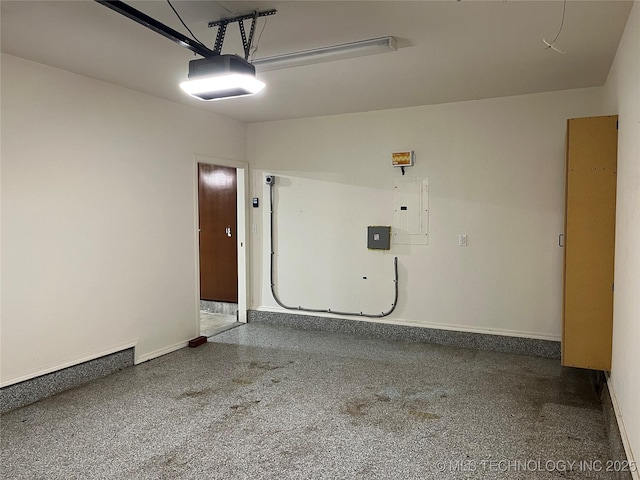 garage featuring a garage door opener and electric panel