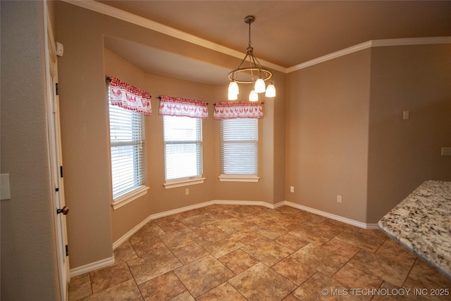 unfurnished dining area with crown molding