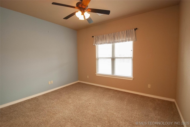 carpeted empty room with ceiling fan