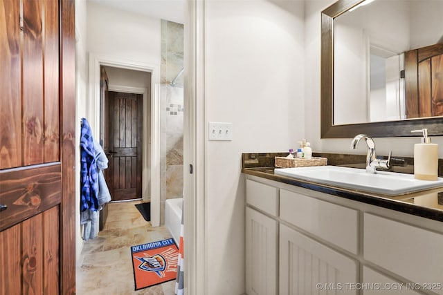 bathroom with vanity and tub / shower combination