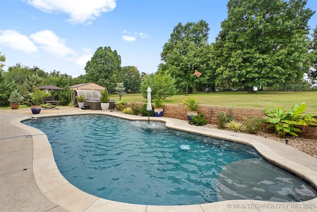 view of pool featuring a gazebo, a lawn, a patio area, and a jacuzzi