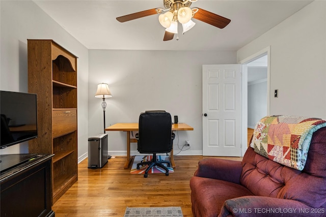 office area with ceiling fan and light wood-type flooring