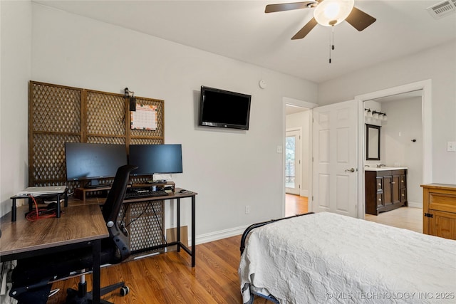 bedroom with light hardwood / wood-style floors