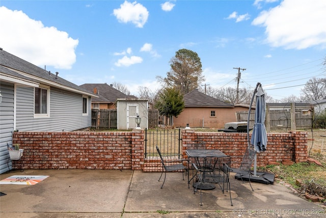 view of patio / terrace with a storage unit