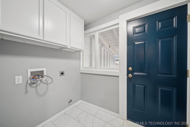 laundry room featuring cabinets, washer hookup, and hookup for an electric dryer